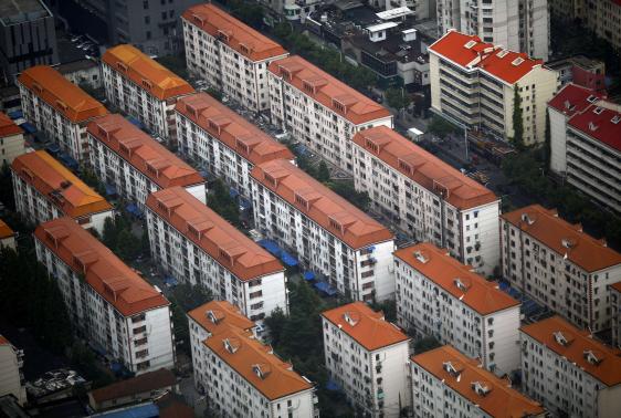 China's rich look abroad as home prices fall, others stay put