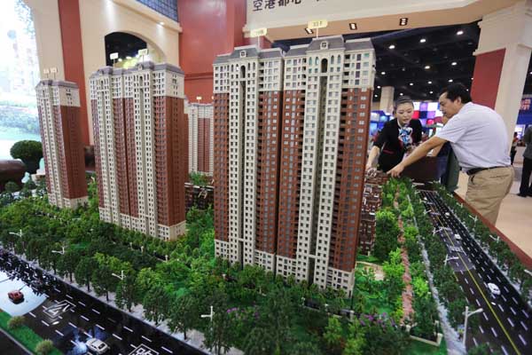 China eases home purchase restriction