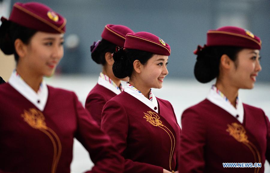 Railway Station's staff members show new suit in Lanzhou