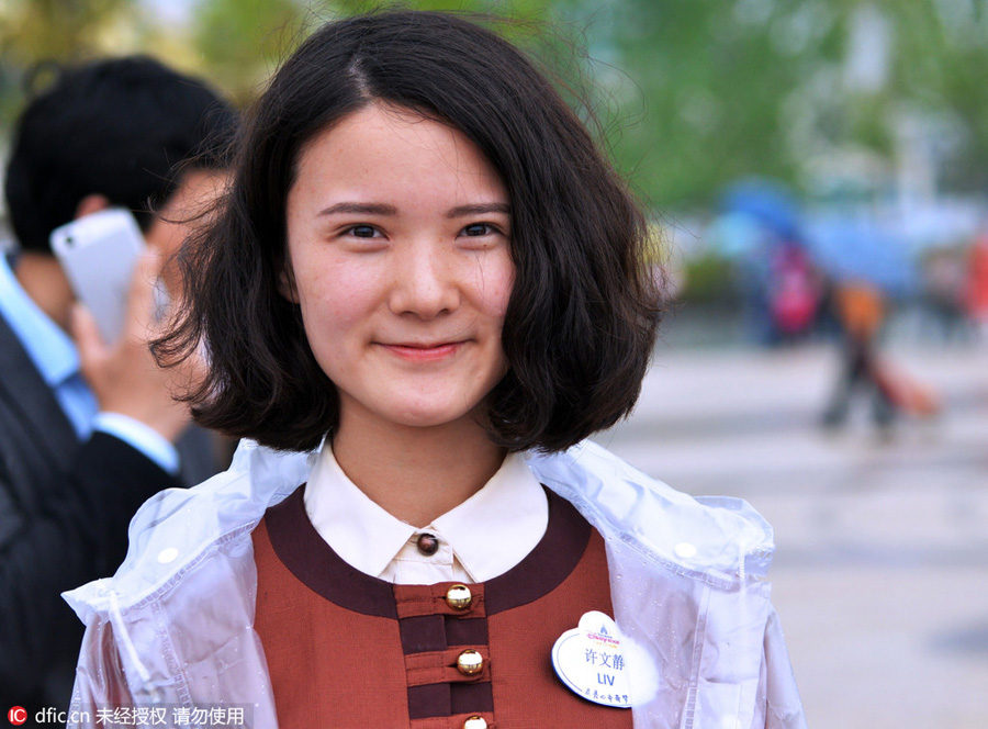 Disney Town staff members greet visitors with smiles