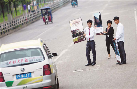 Curbs slow Shanghai home sales