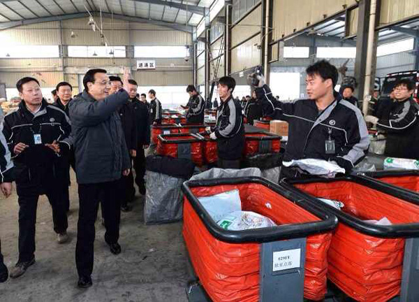 Go global, Premier Li tells domestic courier