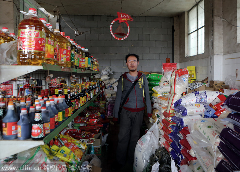 Armless young man runs his own store