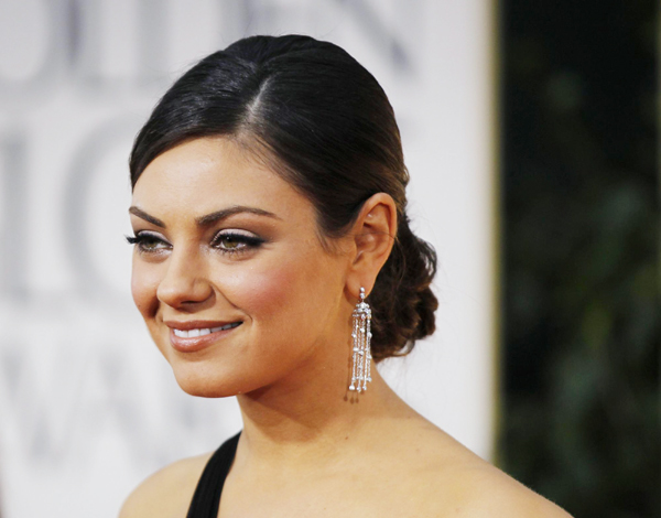 Mila Kunis attends Golden Globe Awards