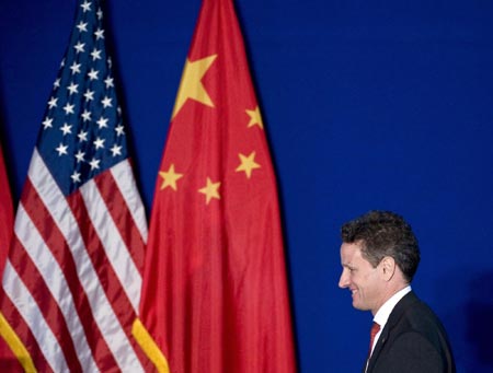 Geithner tells China its dollar assets are safe