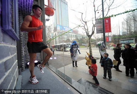 Model jogs in window to promote a healthy workout