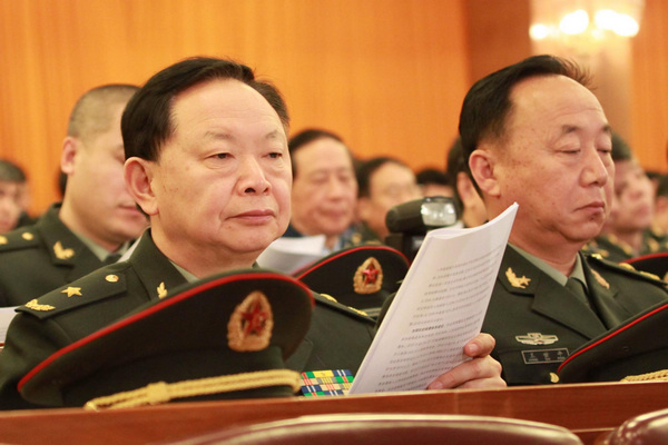 Photo: NPC deputies concentrate on work report