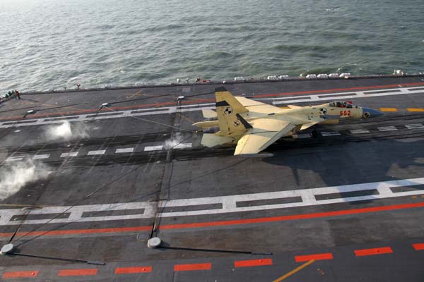 Jets land on China's 1st aircraft carrier