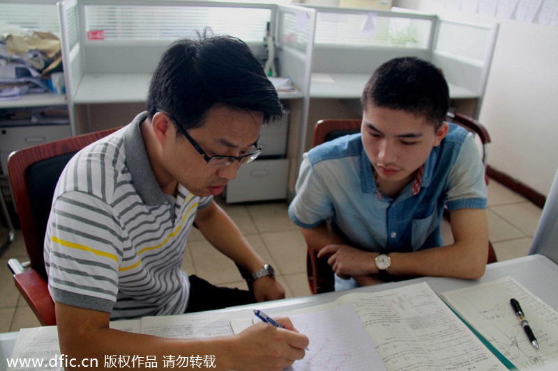 Schoolboy heroes to sit <EM>gaokao</EM> a month late