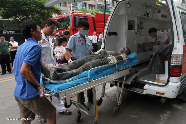 Rescuers save 3 trapped in collapsed building