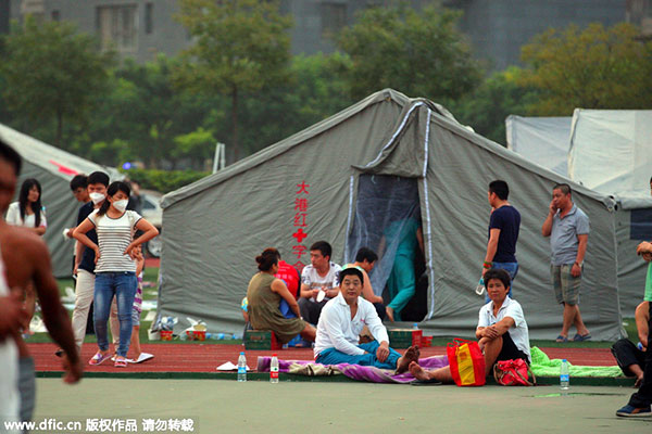 Witnesses recall panic of China's fatal warehouse fire