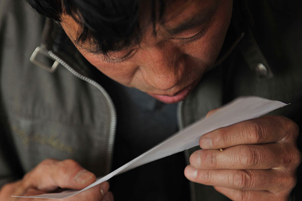 13m unregistered people to be given <EM>hukou</EM> recognition