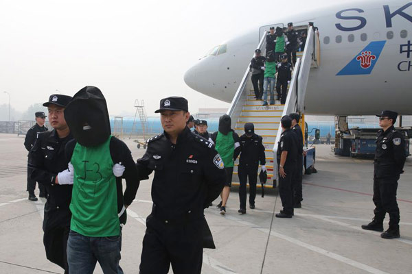 Kenya repatriating 77 Chinese telecom fraud suspects