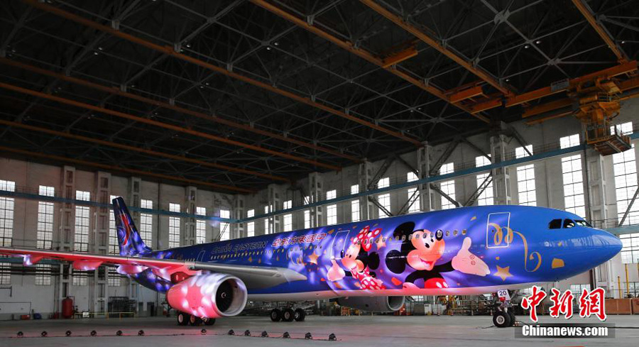 Shanghai unveils Disney-themed plane and station