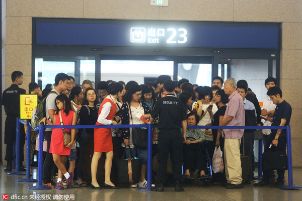 Homemade bombs hurt four at Shanghai airport