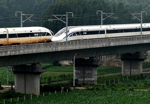 Chinese bullet trains cross in world first