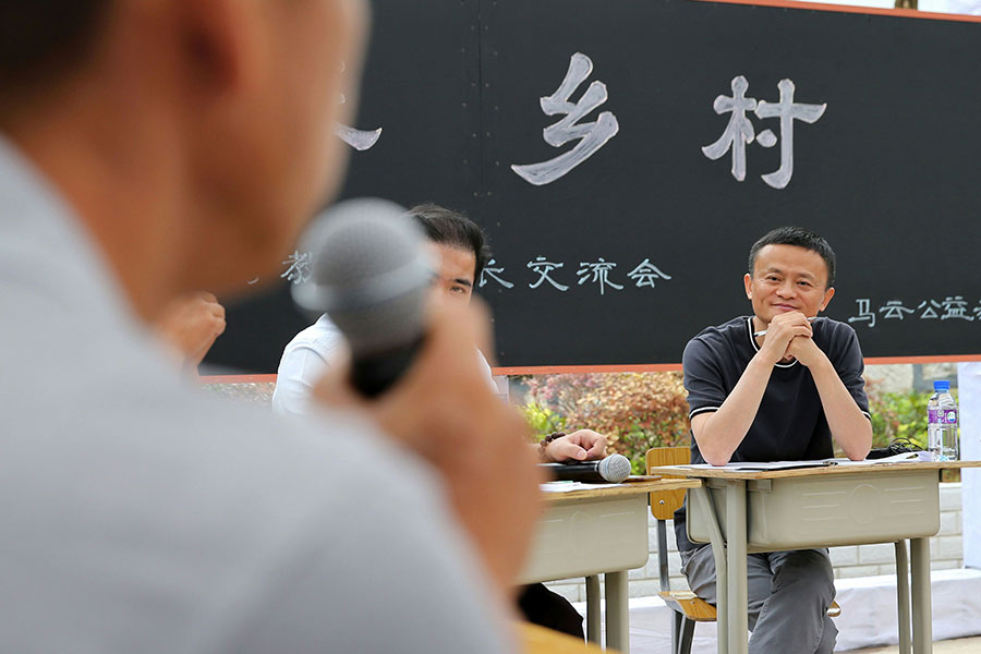 Jack Ma visits rural school, meets teachers