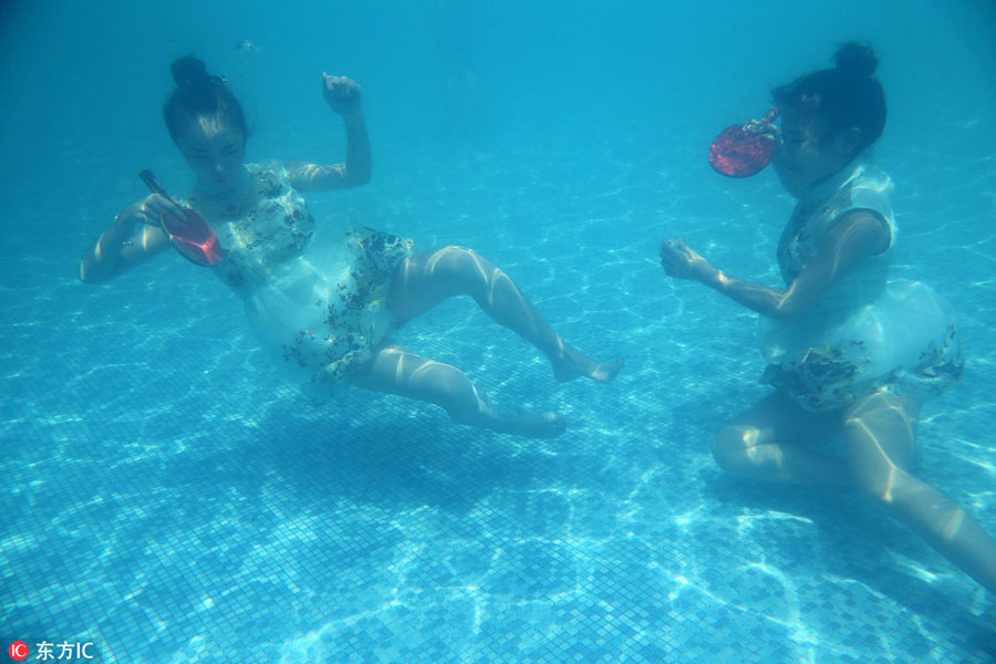 Underwater show cheers for Olympians