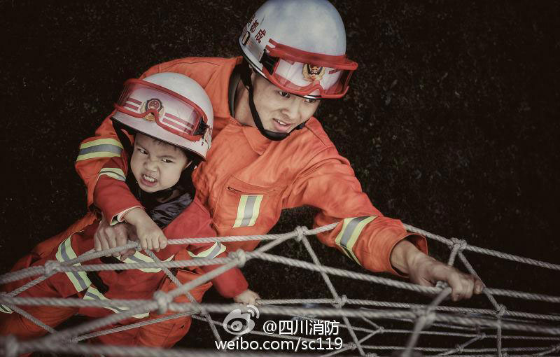 Fireman father and son pose for special family photos