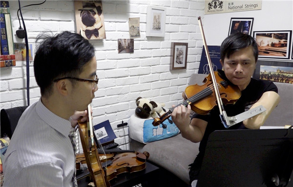 One-armed violinist prepares to take a bow