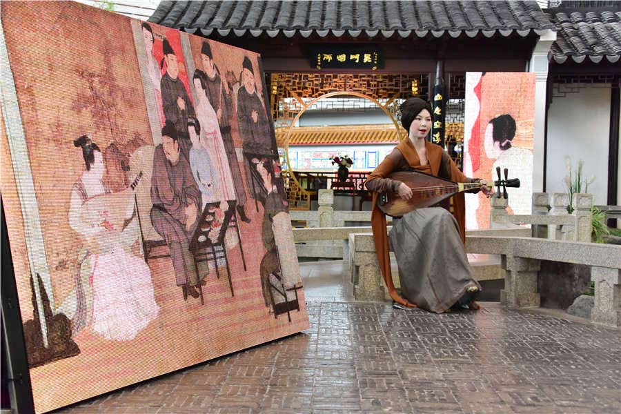 Ancient scroll's digital art show staged in Beijing airport