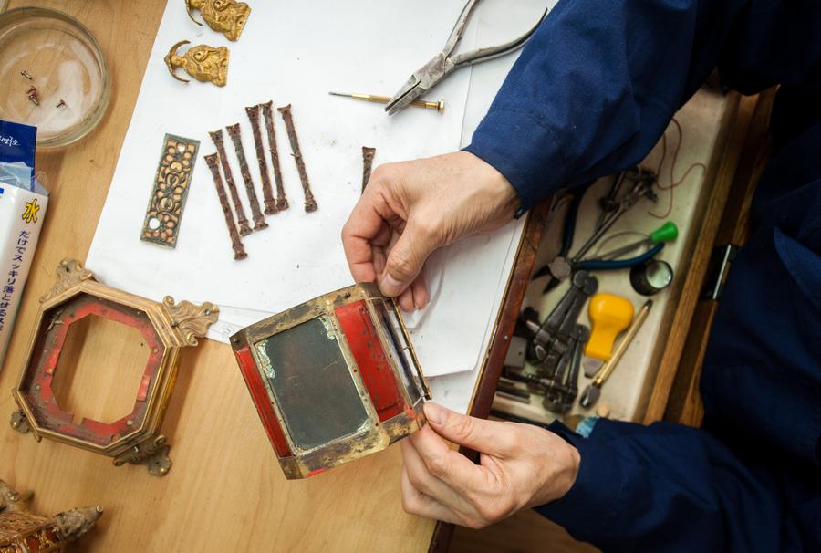 Clock repairman at Palace Museum keeps history in time