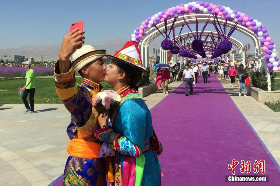 China's many cultures on display in mass wedding