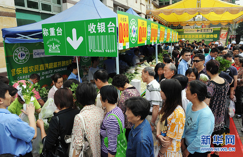 全國各地農(nóng)超對接救助“賣難”菜農(nóng)