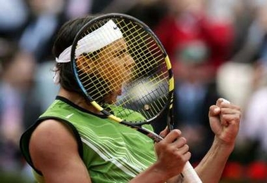 Fourth seed Rafael Nadal of Spain reacts during his match against Frances Sebastien Grosjean, the number 23 seed, in the fourth round of the French Open tennis tournament at the Roland Garros stadium May 30, 2005. Nadal won 6-4 3-6 6-0 6-3. REUTERS