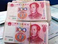 China's 
central bank will "gradually" lessen the degree to which it intervenes in foreign exchange markets, but is not certain the country's yuan currency is undervalued, a senior central bank official said in an interview published on Thursday. 