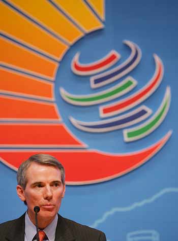 U.S. Trade Representative Rob Portman listens to a question during a news conference at Hong Kong's Convention and Exhibition Centre December 12, 2005, one day before the opening ceremony of the sixth World Trade Organization (WTO) Ministerial Conferences. WTO hopes a December 13-18 ministerial meeting in Hong Kong will inject momentum into struggling global free trade talks.