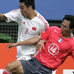 Eight-men China tie S.Korea 1-1 in East Asian champs