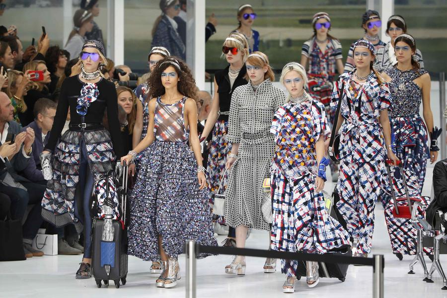 All aboard Chanel Airways as Lagerfeld's imagination takes flight