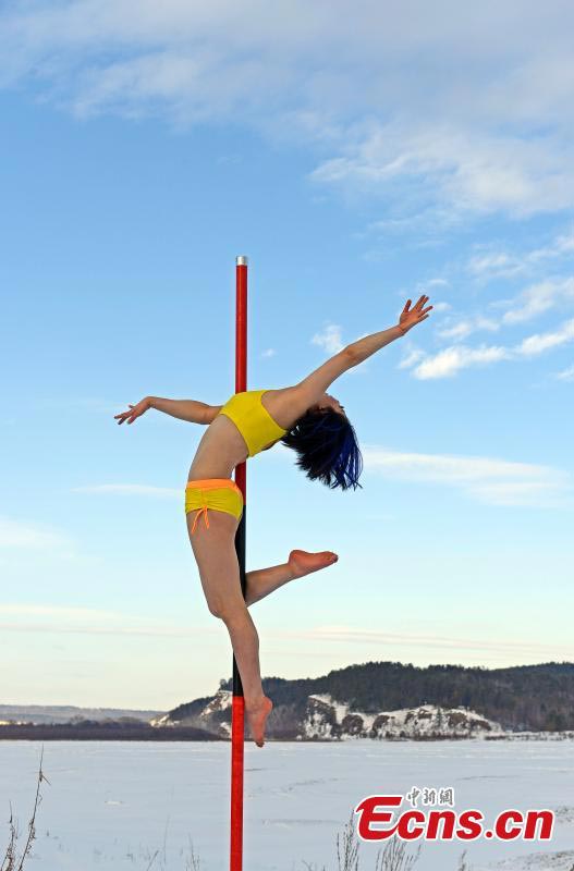 Pole dancers perform in China's North Pole