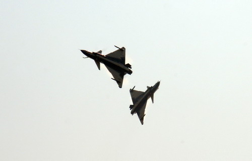 Chinese aerobatic team perform at air display