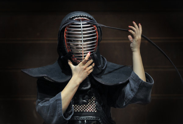 Office workers fight kendo to stay strong