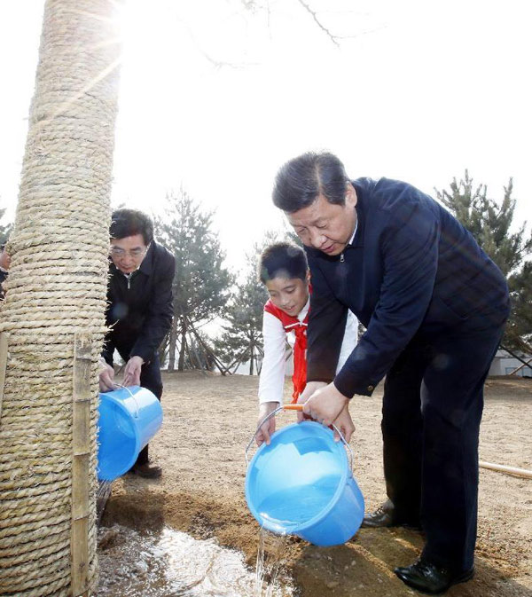 Xi plants trees, promotes 'beautiful China'