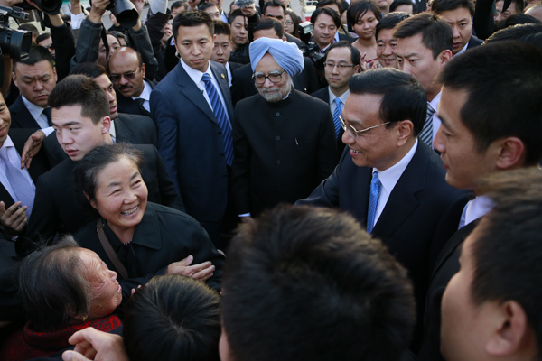 Li escorts Indian PM on Forbidden City tour