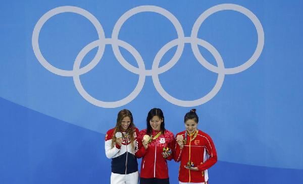 Japan's Kaneto wins 200m breaststroke gold