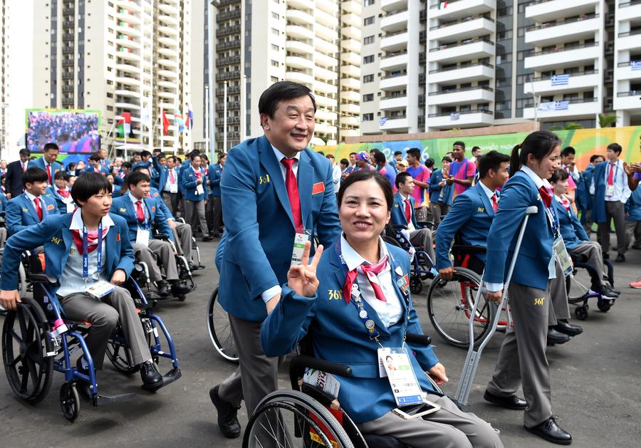 Chinese Paralympic delegates attend flag-raising ceremony