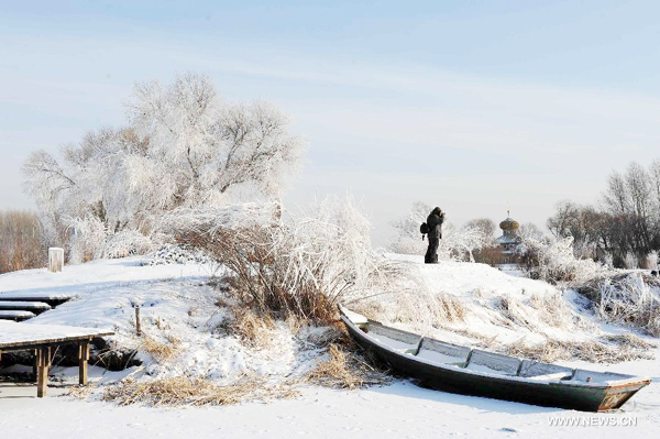 Tourists have fun at Volga Manor in Harbin