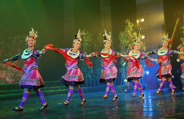 Actors of Miao ethnic group perform dance