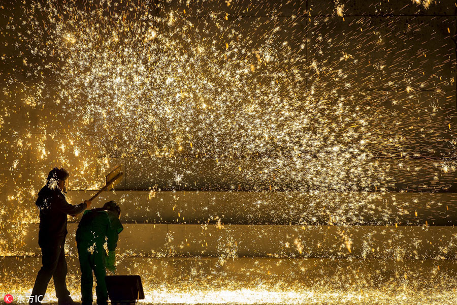 Villagers make sparks in creative celebration of the New Year