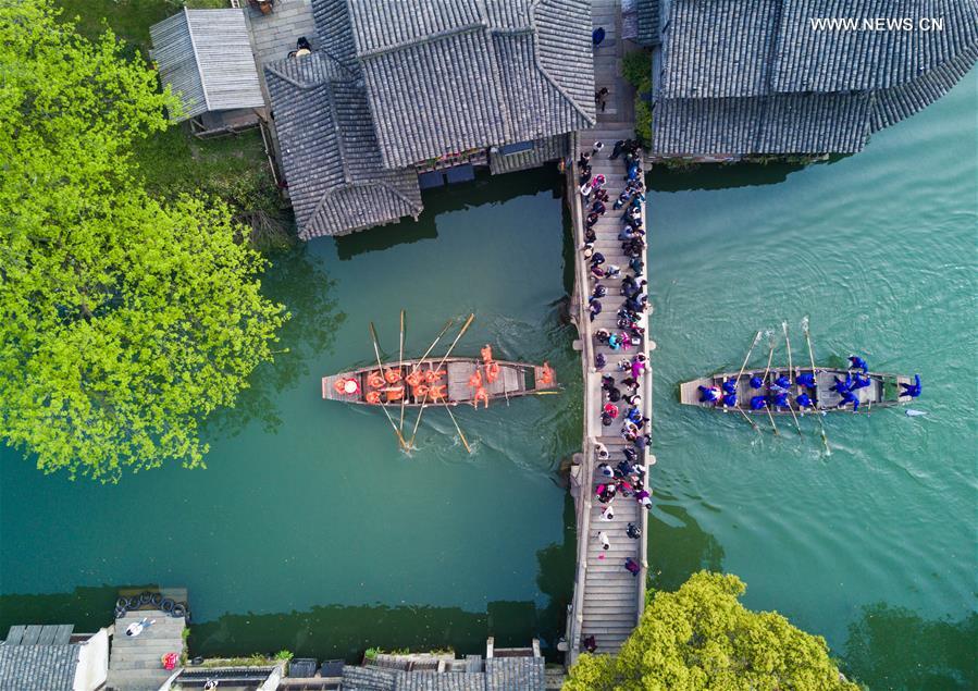 Boat competition held to celebrate Sanyuesan Festival in E China