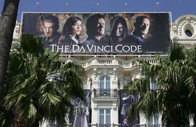 A poster advertising The Da Vinci Code is seen attached to the front of the Carlton Hotel in Cannes May 15, 2006. The film opens the 59th Cannes Film Festival on May 17. [Reuters]