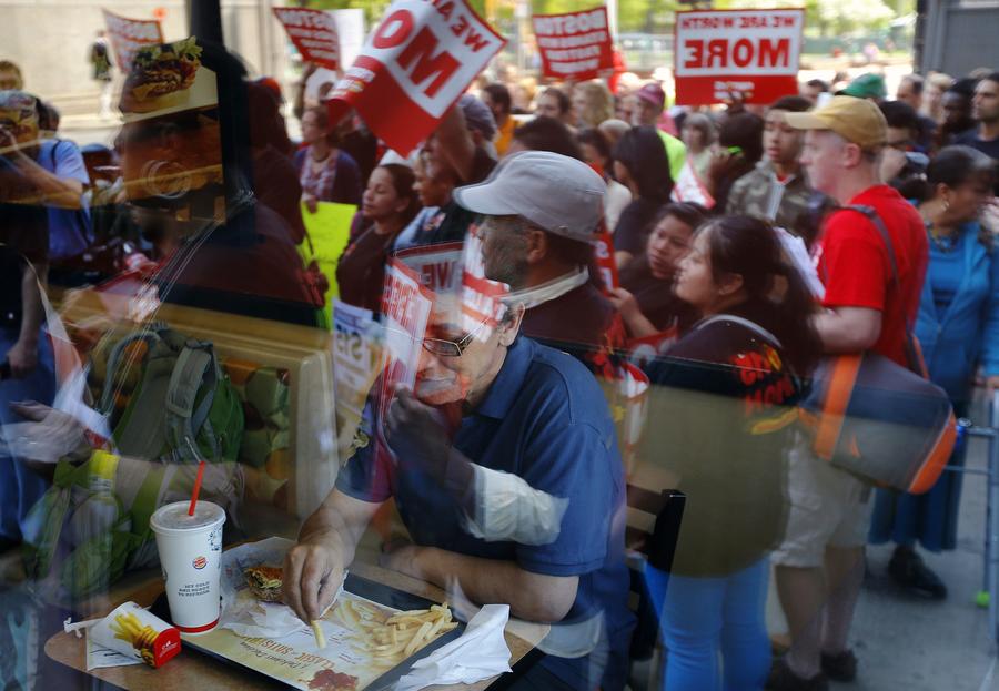 Fast-food workers strike for higher pay