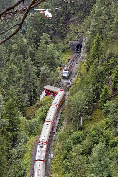 Swiss passenger train derails into ravine, 11 injured