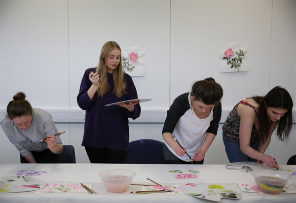 International friendship blossoms in peony painting