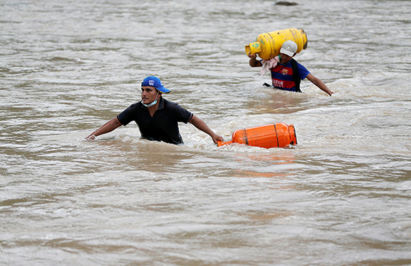 Death toll climbs to 207 in Colombian landslide