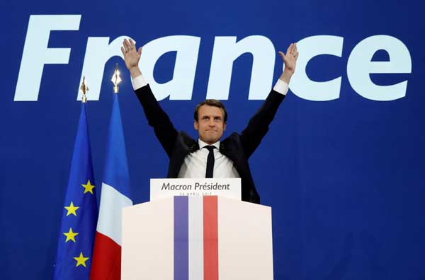 Macron, Le Pen headed to runoff in France